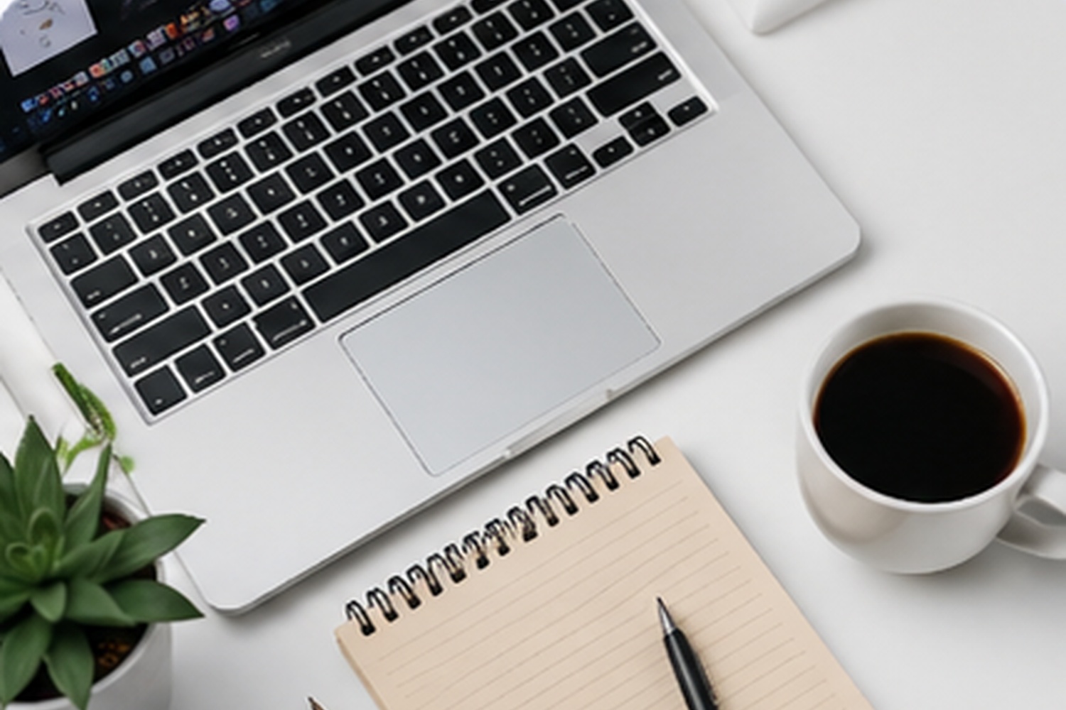 Laptop and coffee on a desk